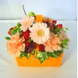 東京都港区Ｆｌｏｒｉｓｔ　Ｓｕｔｏの花　オレンジ＆レッドコットンバッグアレンジ